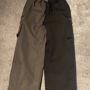 Grå svart capeesh - Använda fåtal gånger nästan ny skick storlek s