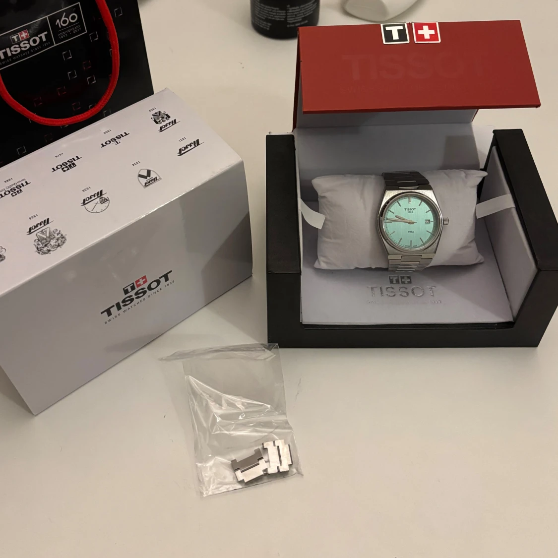 Tissot PRX med mintblå urtavla - 1