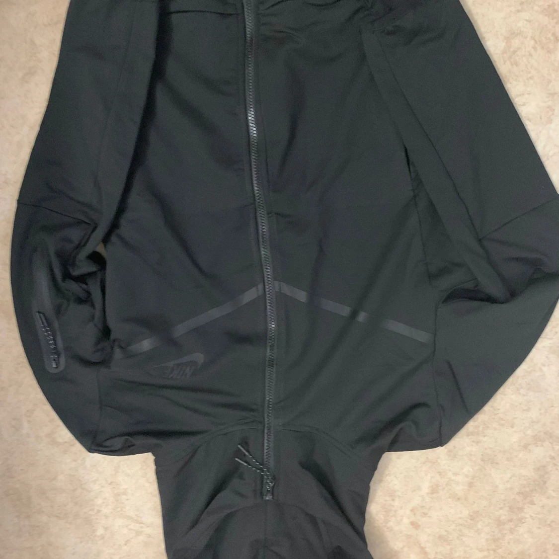 svart nike tech för sport