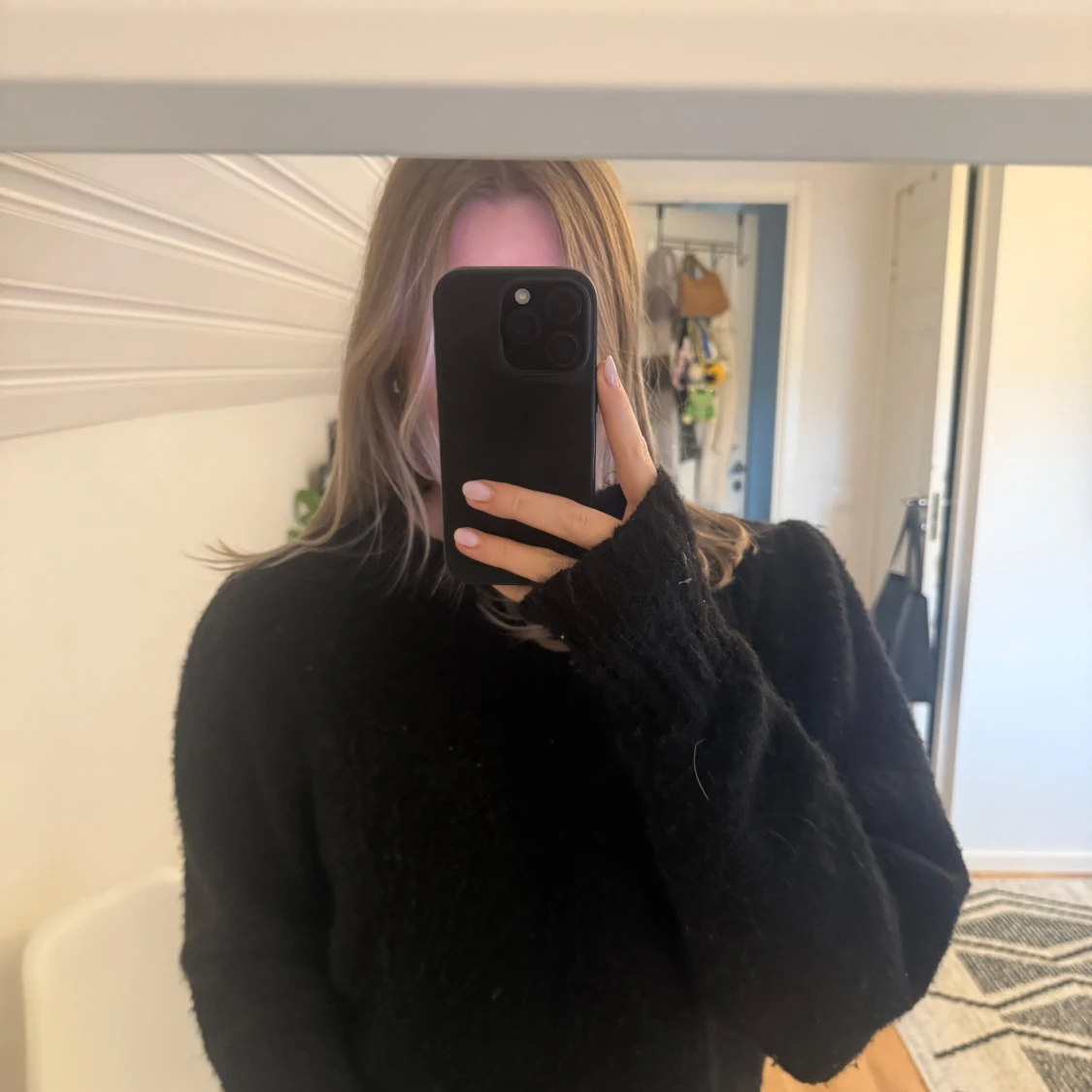 Svart stickad tröja i oversized modell