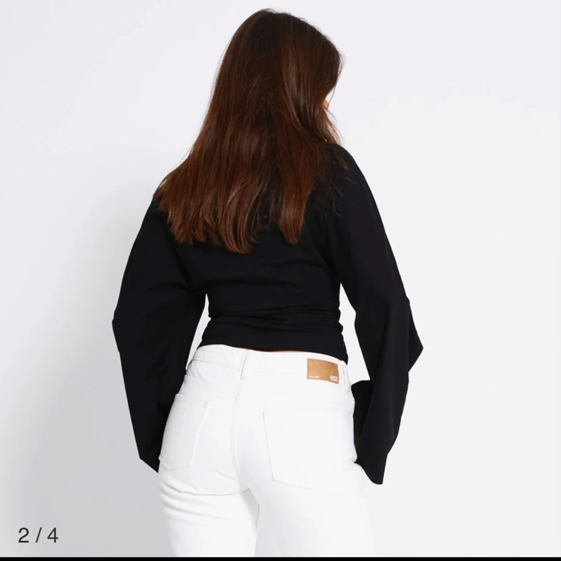 Svart långärmad topp med vida ärmar - 1