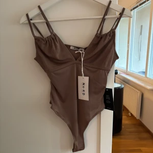 Body - Ny med prislapp kvar