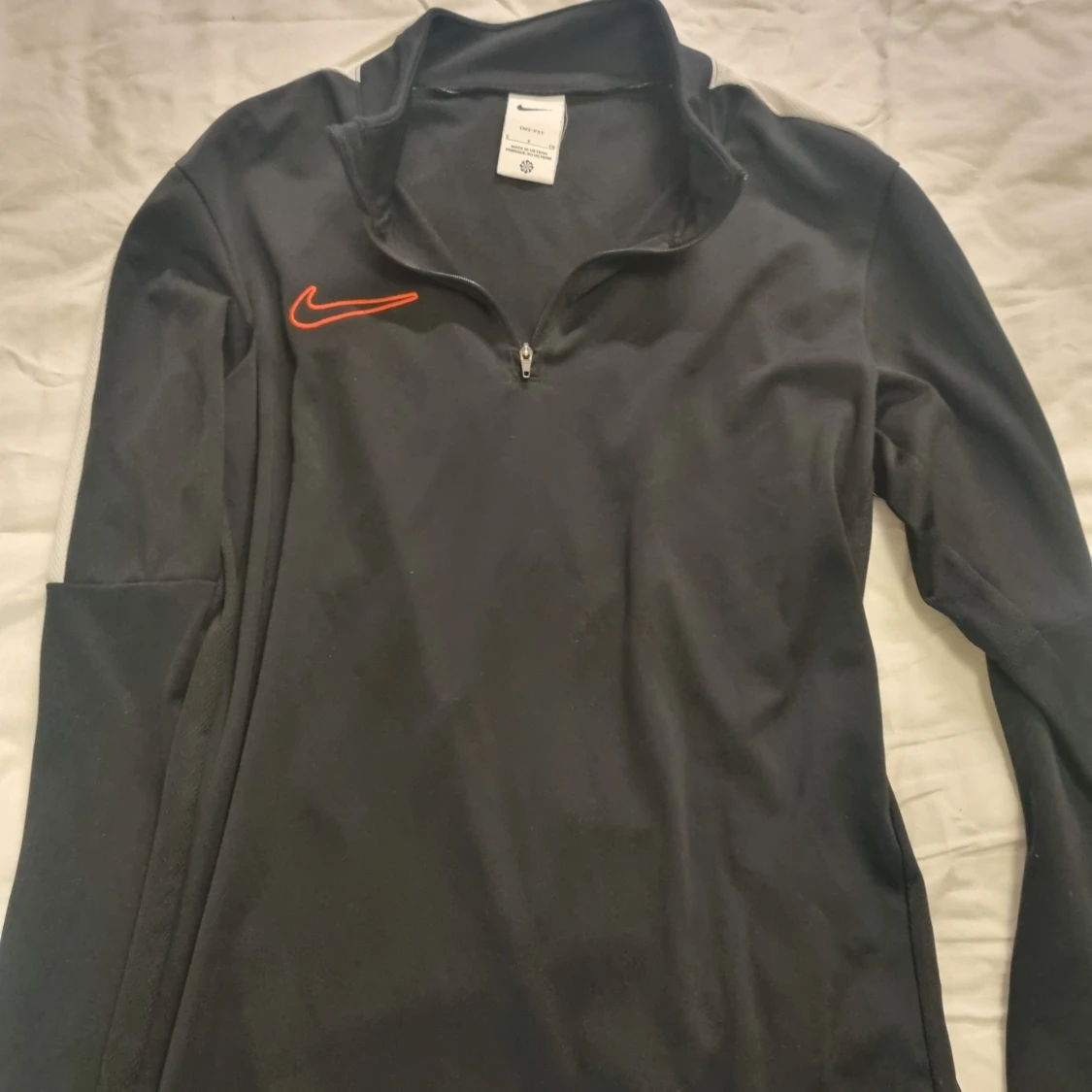 Svart Nike half zip träningströja