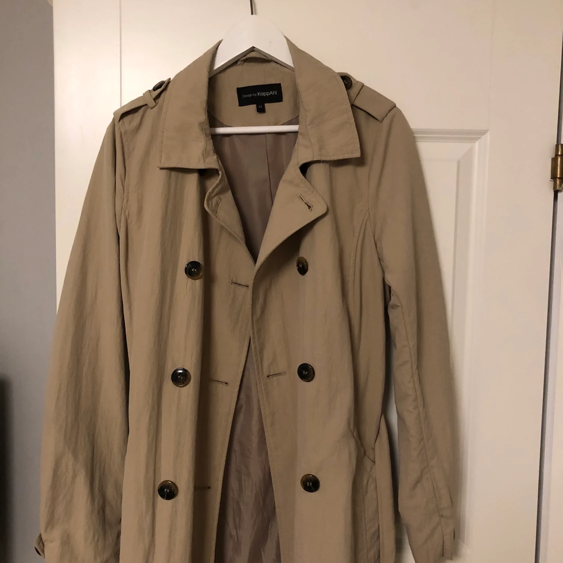 Beige kappa från Kappahl  - 90