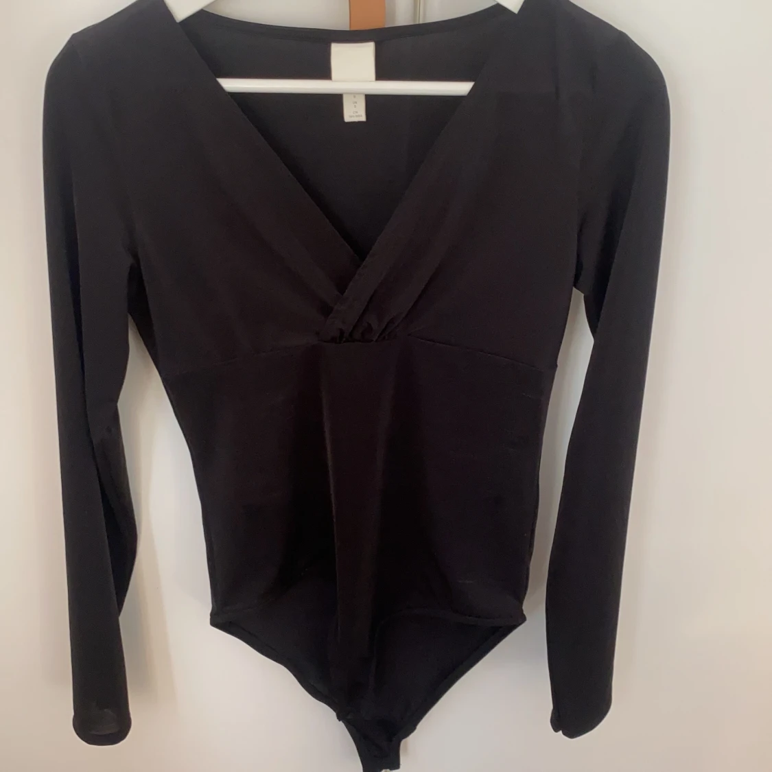 Svart långärmad body