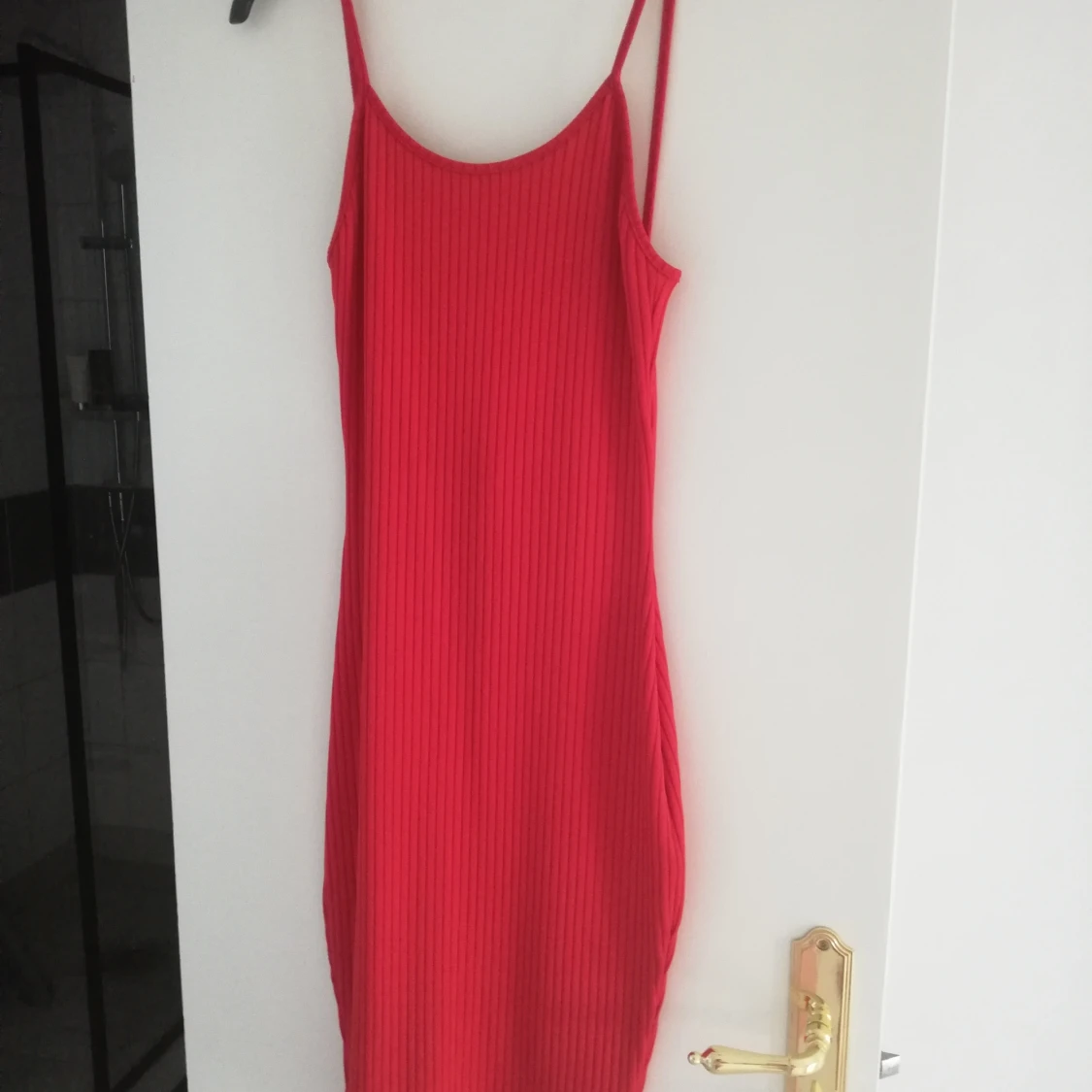 Röd tight klänning
