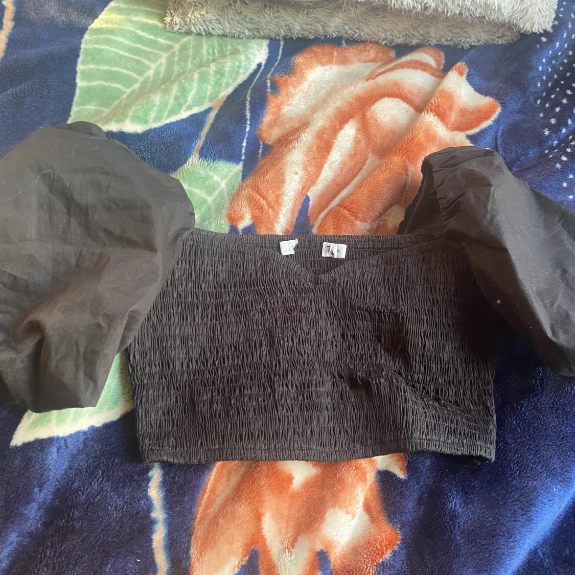 Svart kroptop med ballong armar - 90