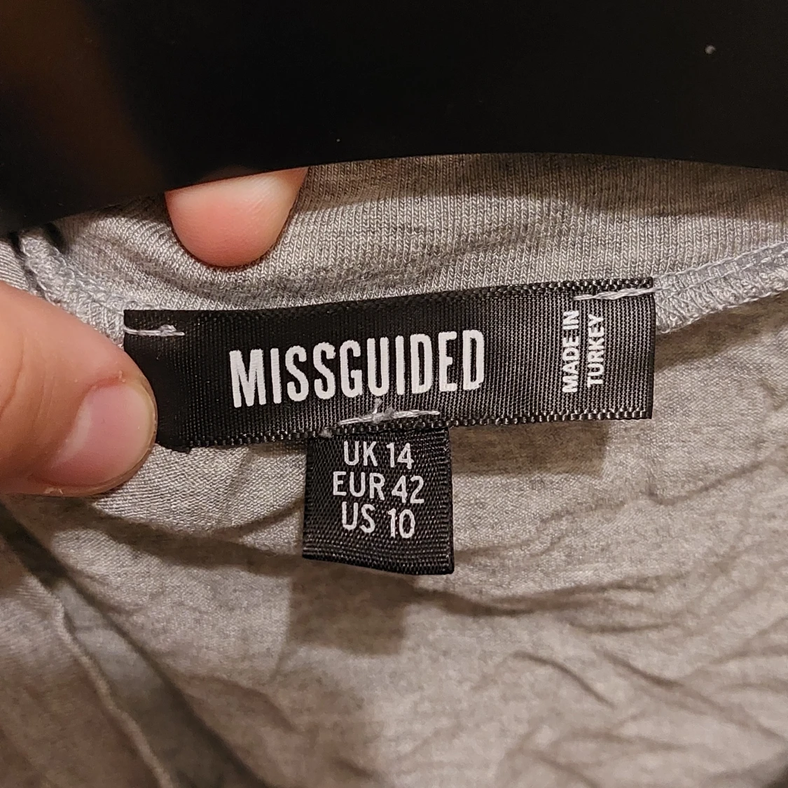 En pyjamas magtröja i storlek 42.