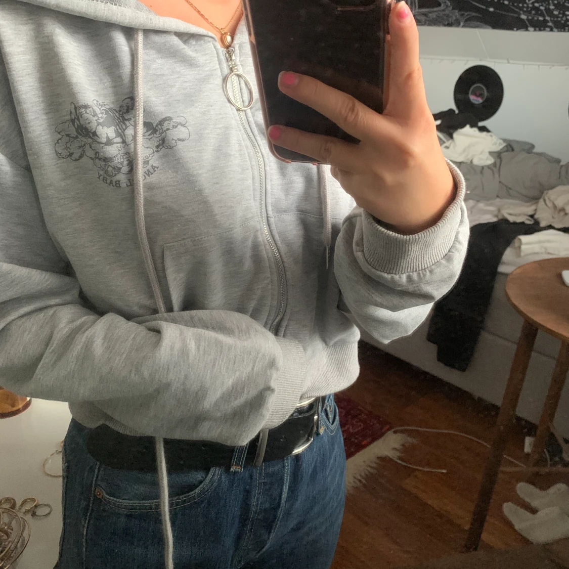 cropped kofta med ett litet tryck