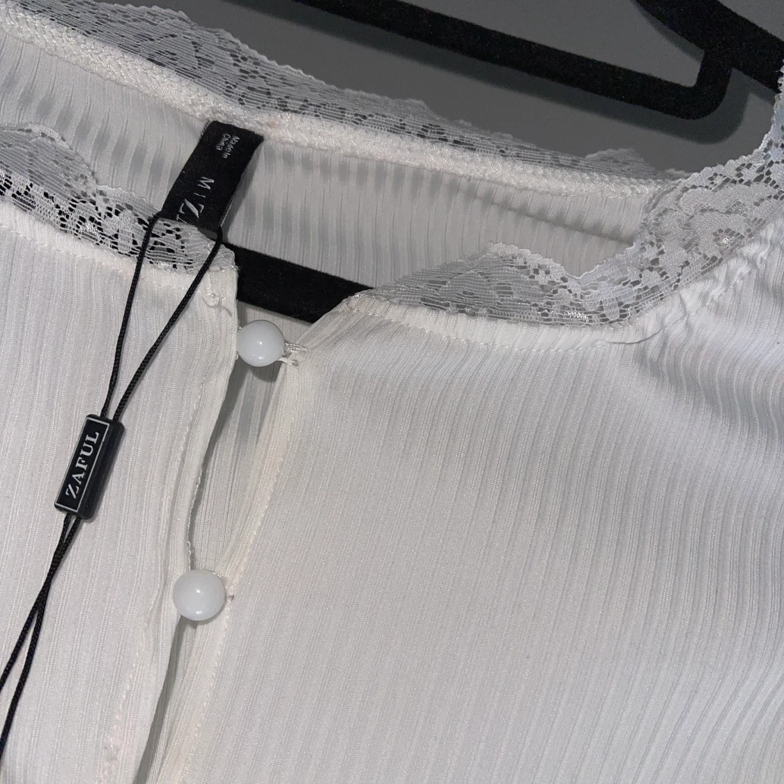 Ribbad tröja med knappar - 90