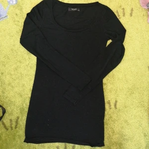 Black top  - The neckline is around and deep for me. I rarely wore it. 