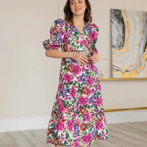 Klänning  - finns olika storlek och fri leverans till hela Sverige 