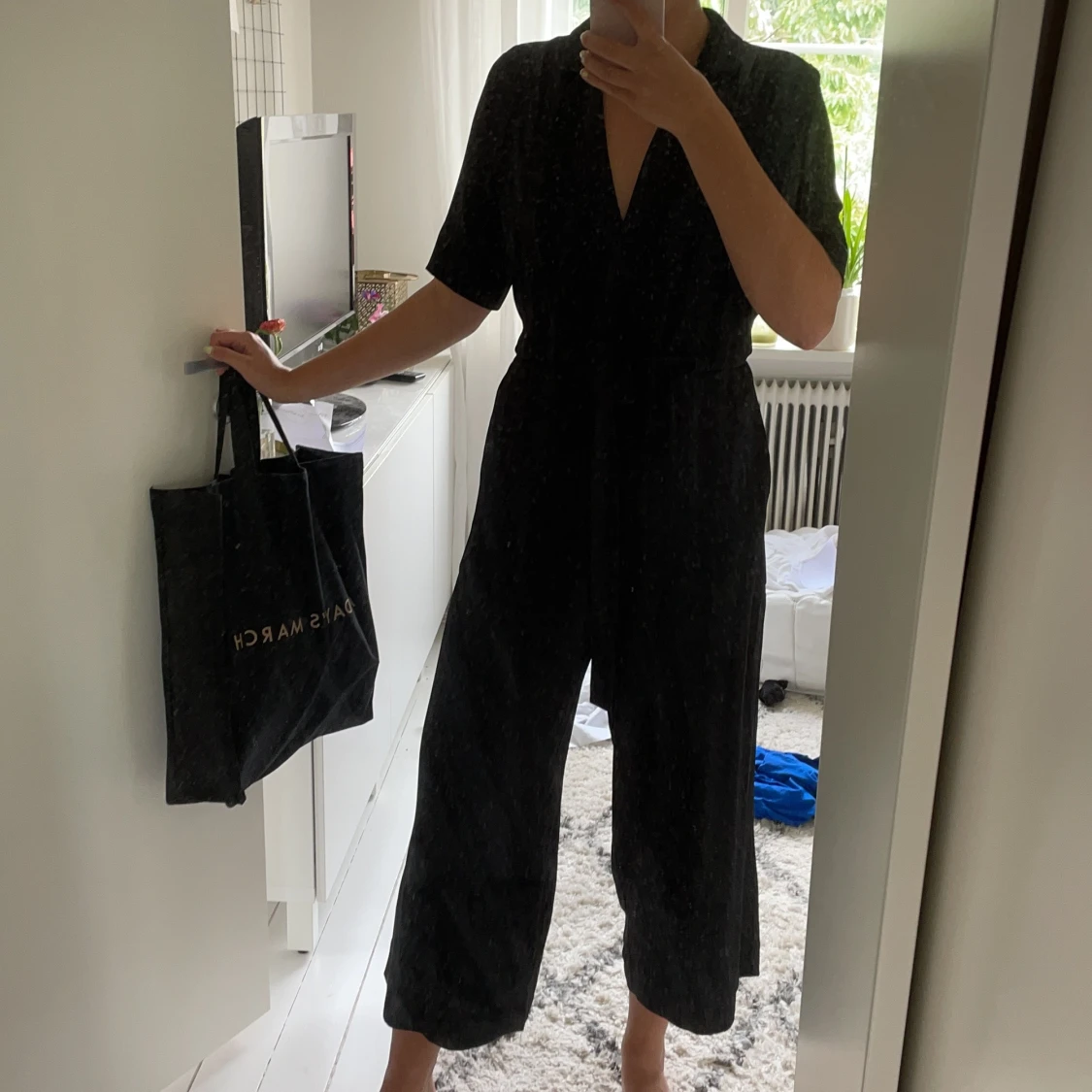 Svart omlottjumpsuit från Weekday 