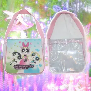 Powerpuff girls purse  Brand: unknown  Material: unknown  Decade: 00s  Measurement: length (with the band) 47 centimeters width: 27 centimeters  Condition: good - has marks but nothing that impacts the overall look. Dm for international shipping. Also available at depop and Instagram 