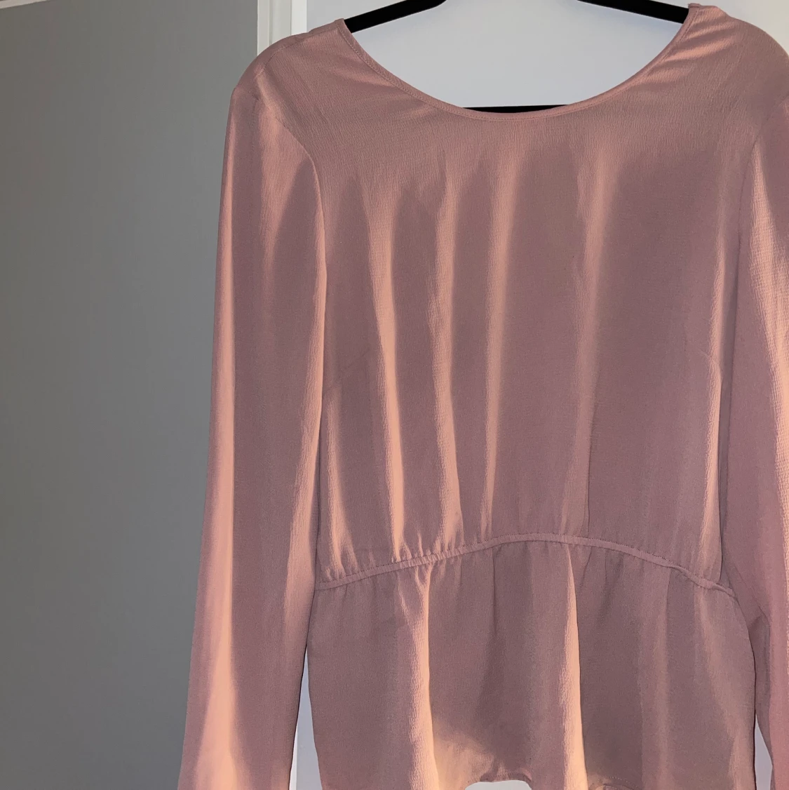 Topp med djupare rygg