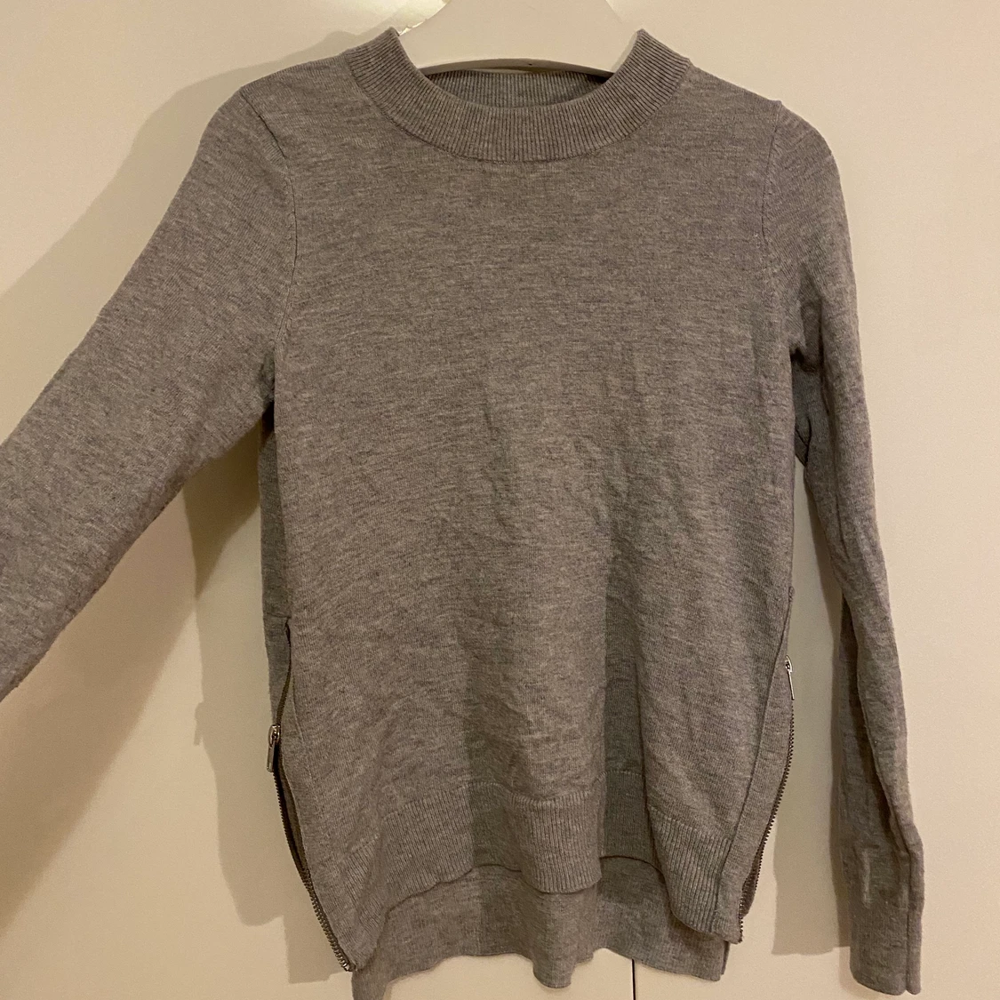 Stickat med dragkedja