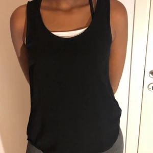 Svart linne - Svart linne med skönt material. Storlek S