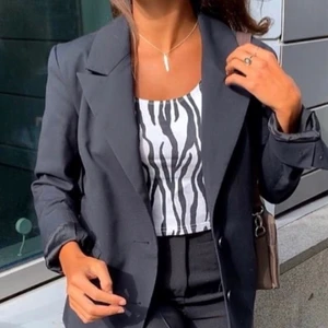 Kavaj  - Svart kavaj från HM studios 