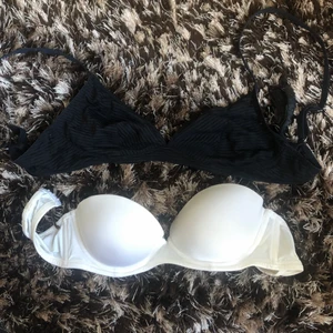 Bh:ar - Två bh:ar, båda i 75B. Den svarta är utan bygel och ingen vaddering. Den vita är utan axelband och slät, ingen pushup. Båda ingår i priset. Gratis frakt 🥳 säg till så skickar jag fler bilder! 