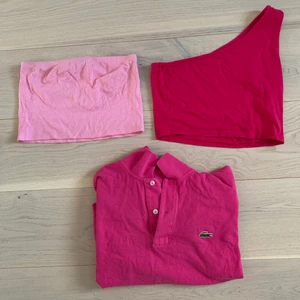 Toppar  - Rosa toppar! Ljusrosa bandeu storlek 36/38! Mörkrosa toppen från vero Moda pieces är i storlek S och Lacoste skjortan är oversized tröja! 