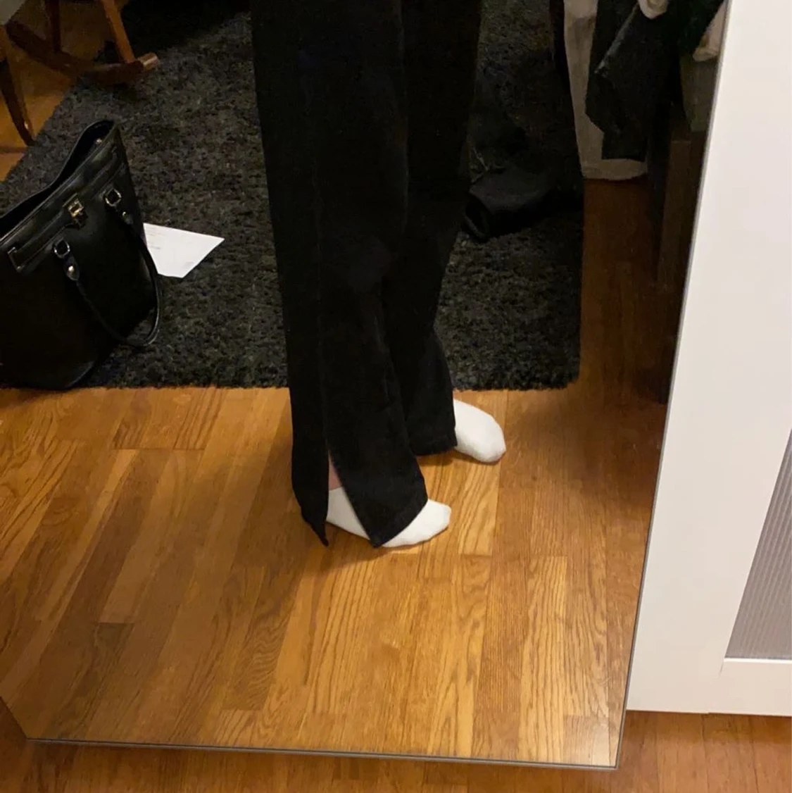 Svarta jeans med slits - 91