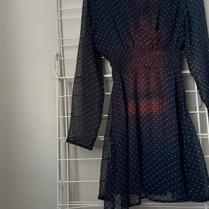 Sommarklänning - Ca 1 år gammal. Perfekt för sommaren