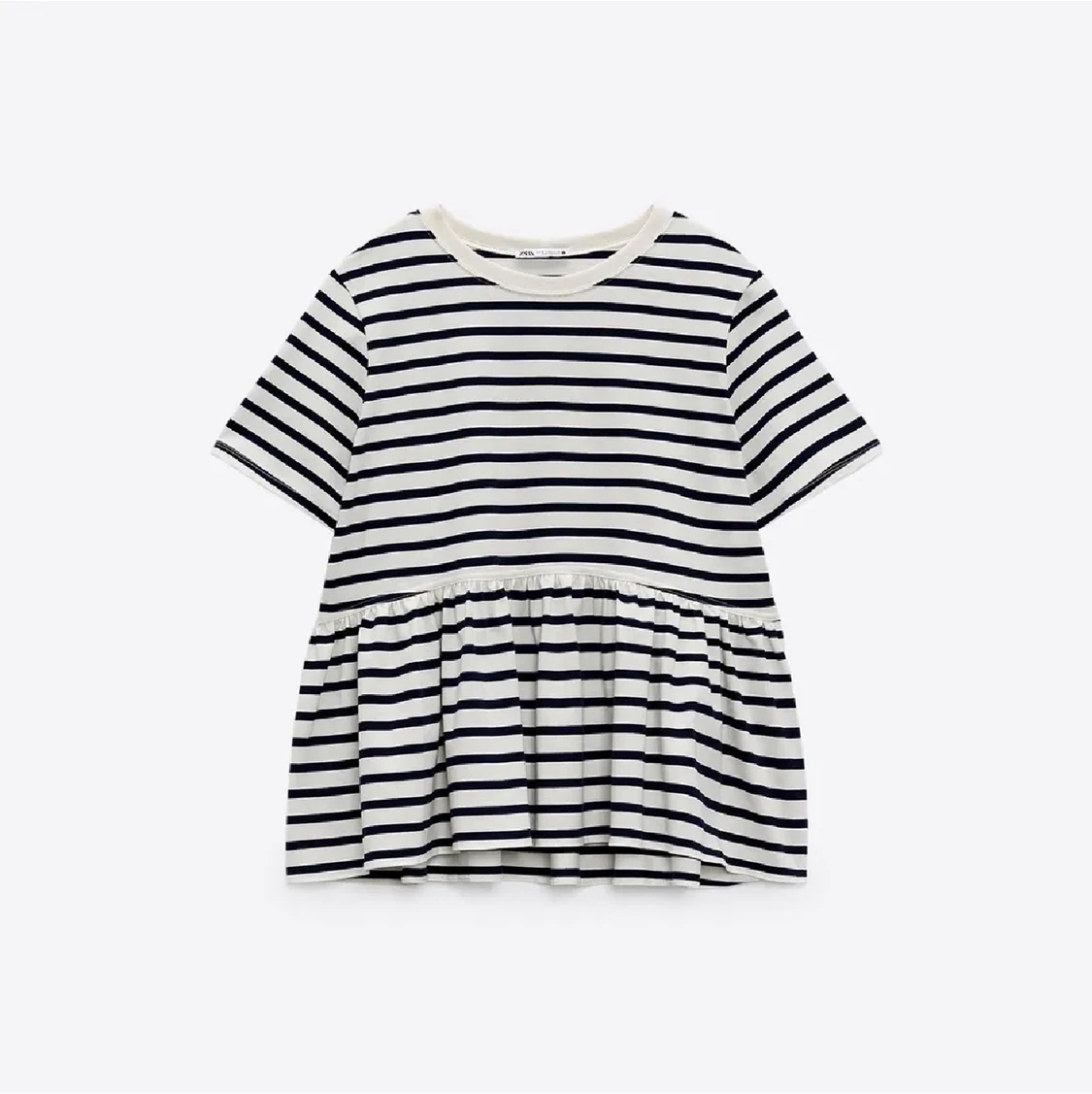 Kombinerad t-shirt med peplum - 90