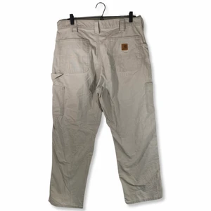 Vintage Carhartt Chinos - Vintage Carhartt Chinos. Storlek: 36x30. Färgfläckar.