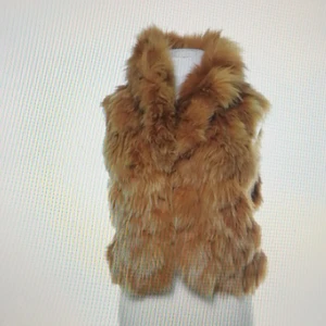 Pälsväst - Äkta pälsväst perfekt till vintern.                                  Storlek M