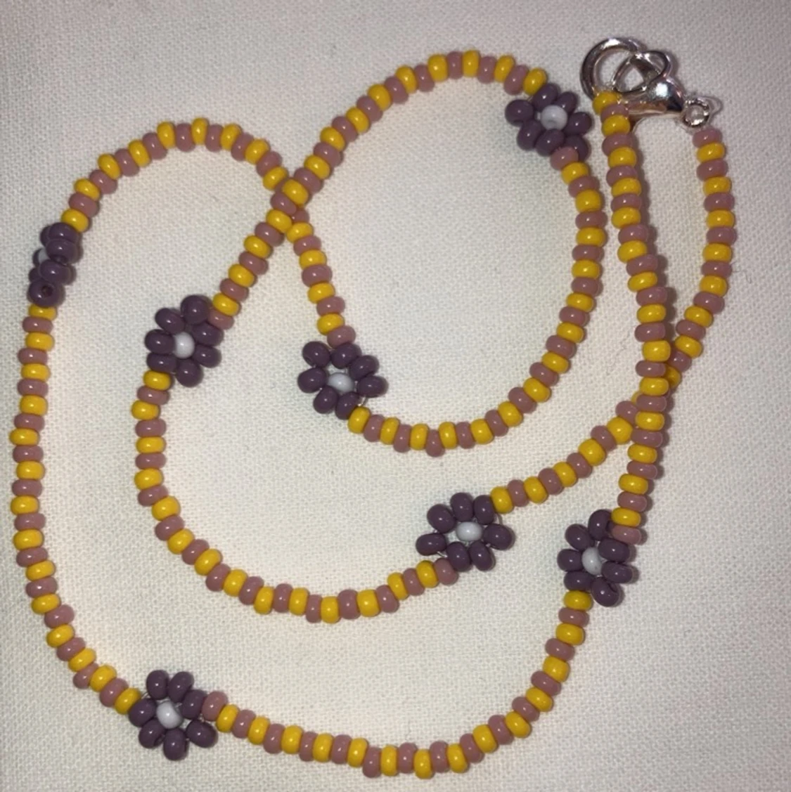 Halsband blommor - 91