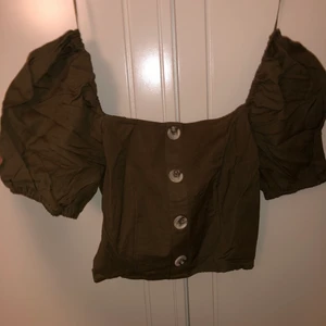 Topp - Aldrig använd. Grön fin topp från river island. 