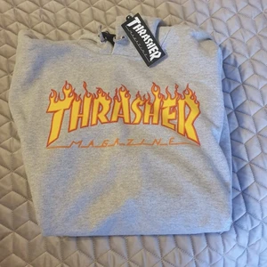 Trasher hoodie - Storlek XL.Helt ny och oanvänd.Var en julklapp,men tiden för att kunna återlämna gick ut.Kvitto finns och medföljer,inköpspris 1000 kronor
