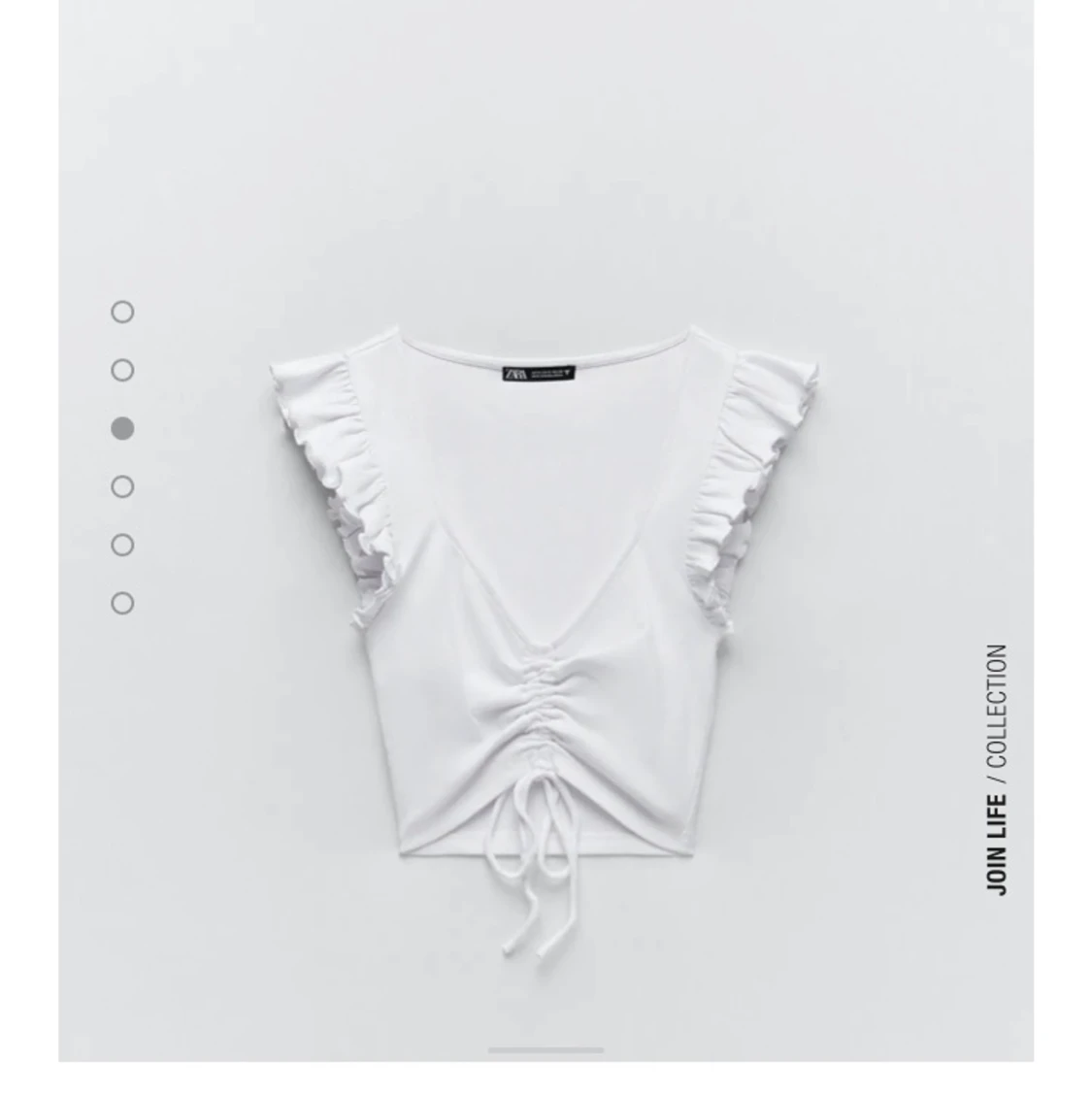 Vit crop top, linne med volanger i storlek M - 90