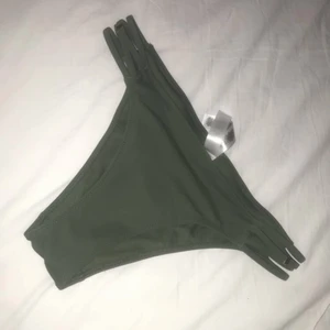 Badkläder  - Jag säljer åt en vän hon tyckte inte om färgen så valde o sälja den.