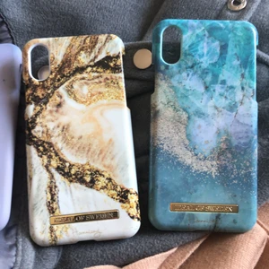 iPhone X skal  - 4 iPhone X skal, 2 från ideal of sweden och två från hm. Dem lila och rosa är mer pastellfärger i verklighet. Dem från ideal of sweden är knappt använd så dem är i nyskick. Du kan köpa ett skal för 30kr st eller allihopa för 100kr. Nypris för alla tillsammans är ~700kr. Köper du alla för 100kr så är frakten inräknad. Köper du ett skal så blir det 12kr+ ❤️