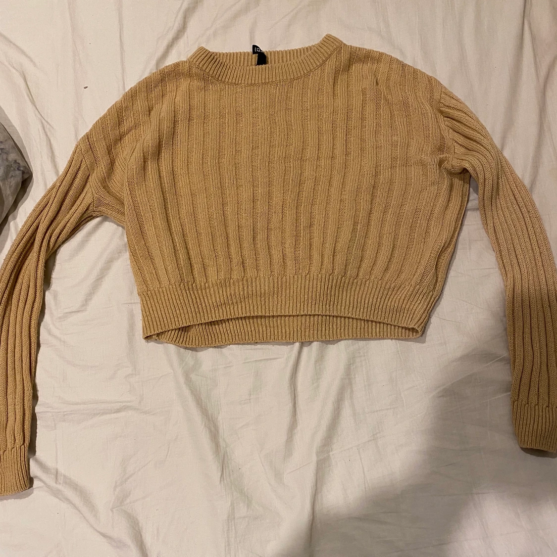 En kroppad tröja  - 91