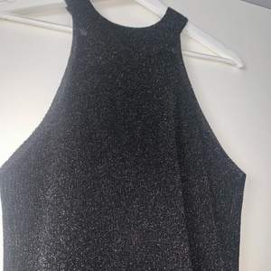 This is a sparkly top from Mango, worn once, in very good condition. 