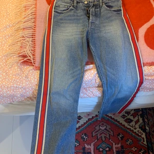 Zara TRF Denim, Size 38 - Barely worn, straight, ankle-length jeans with red stripe detail on sides. Women’s size 38