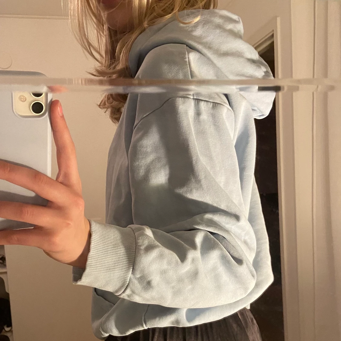 Ljusblå hoodie 