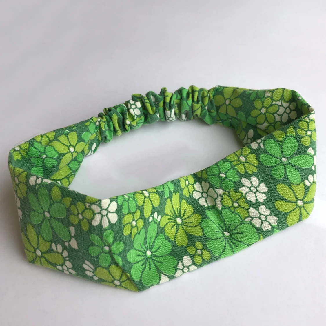 Blommigt hårband - 90