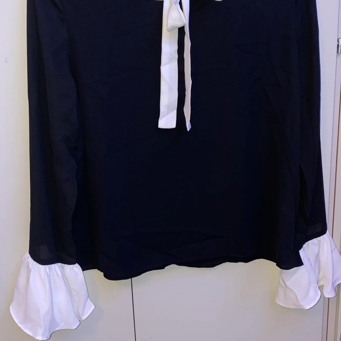 Black bell sleeve blouse - 90