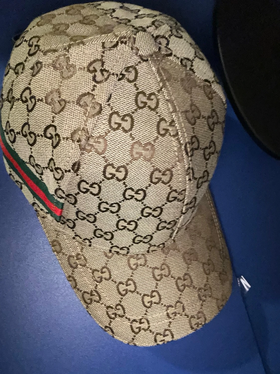 Beige keps från Gucci med GG-mönster