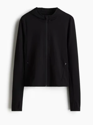 Träningjacka med huva - Storlek XS. Helt ny med lapp kvar. Nypris 449kr. Väldigt skönt träningsmaterial och snatchar midjan väldigt fint. 