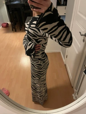 Mönstrad klänning  - Fin mönstrad klänning från NAKD, aldrig använd💗💗