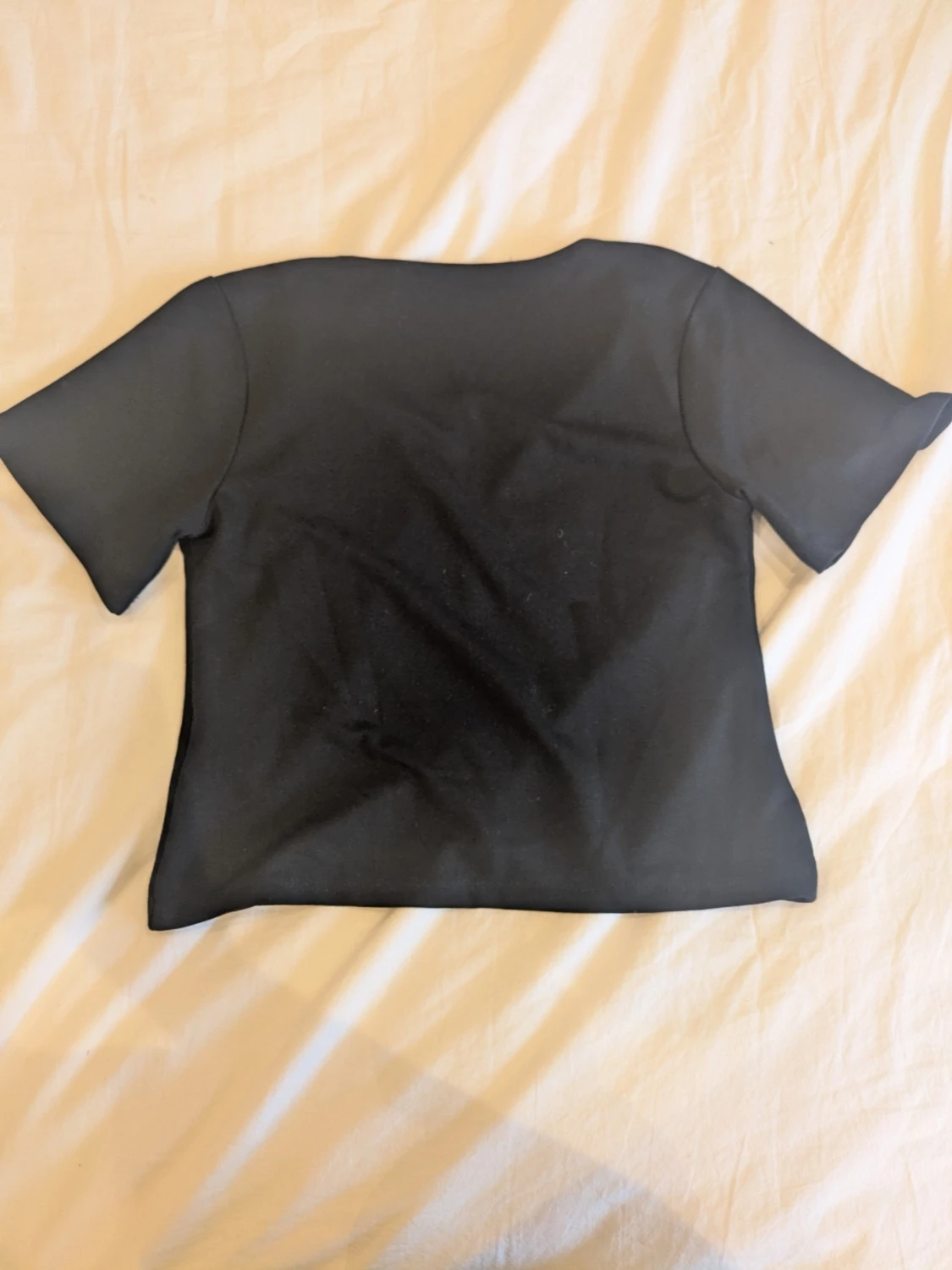 Svart kortärmad topp från 157 - 3