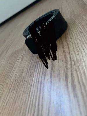 Svart rutig bälte - Bra skick, kom privat för fler bilder och info