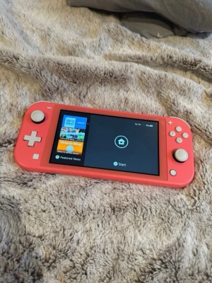 Nintendo Switch lite - Knappt använt Nintendo Switch med laddare