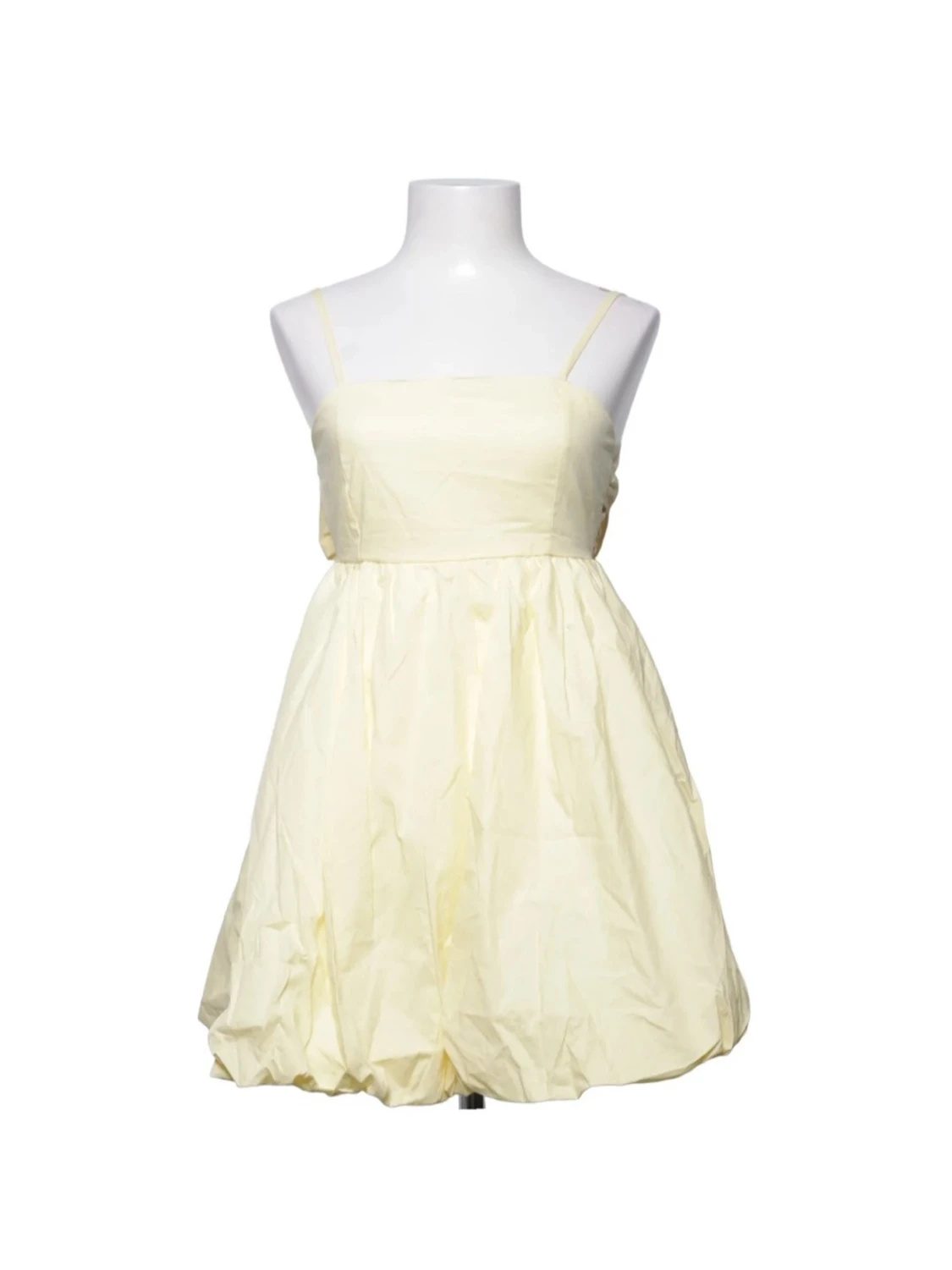 Ljusgul kort klänning med rosett - 1