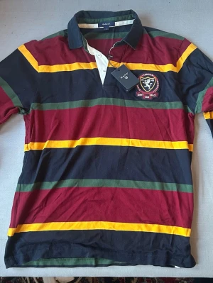 GANT långärmad piké  - Oanvänd GANT långärmad piké med prislapp kvar