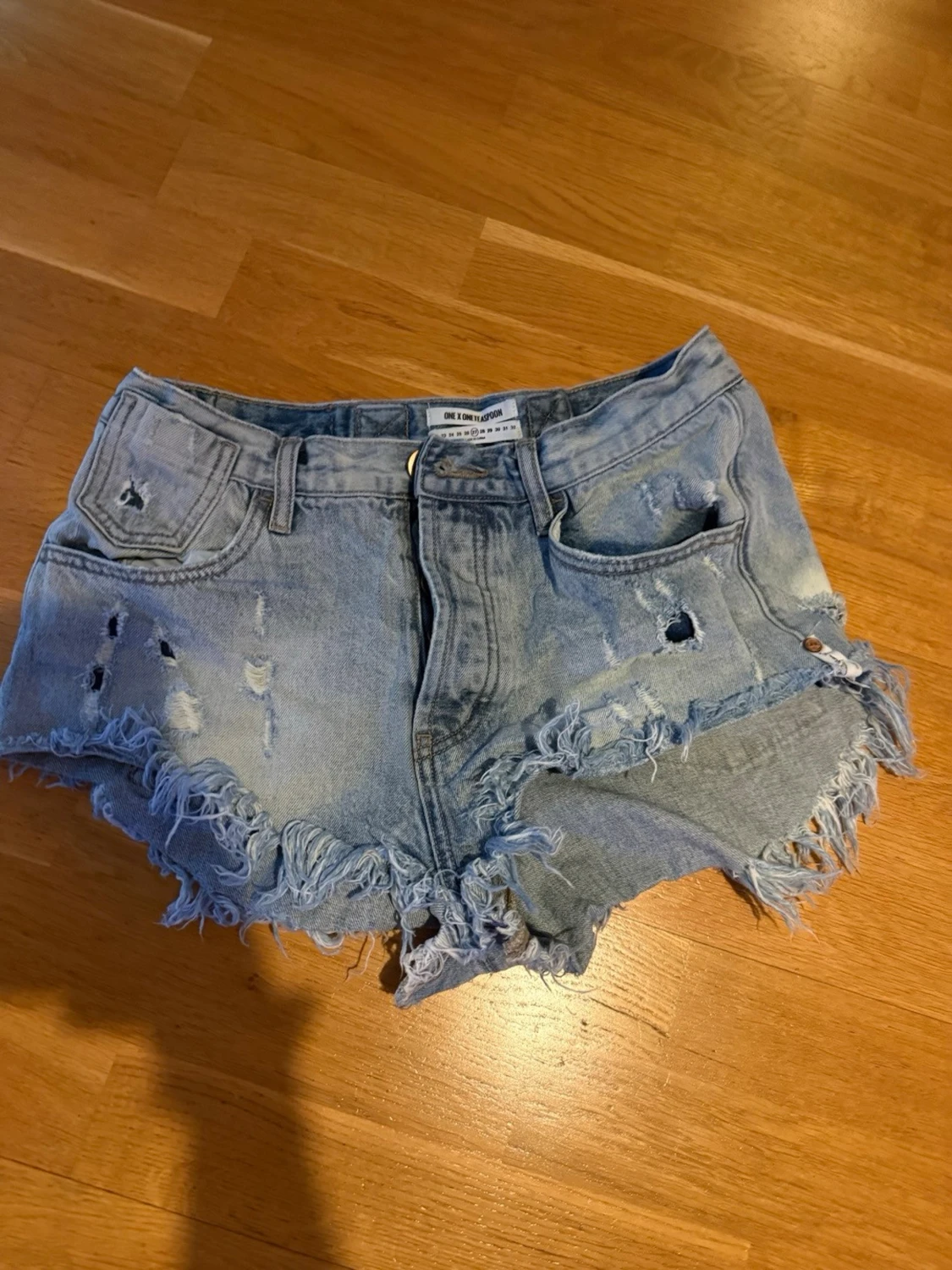 Vintage Ljusa jeansshorts med fransar